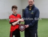 North Antrim Youth Development Officer Declan Heggarty presenting St Mary's GAC Ahoghill captain Culla McDonnell with the North Antrim U14 Division 3 Airborne Hurling League Shield.